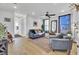 Spacious living room with gray sofas and a large TV at 157 Pocket Bend Cir # B, Summerville, SC 29486