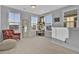 Home office with large windows and built-in shelving at 157 Pocket Bend Cir # B, Summerville, SC 29486