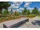 Modern park bench overlooking a pond and neighborhood at 157 Pocket Bend Cir # B, Summerville, SC 29486