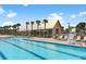 Expansive pool area with adjacent clubhouse and lounge chairs at 157 Pocket Bend Cir # B, Summerville, SC 29486