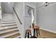 Modern staircase with wooden steps and white risers at 157 Pocket Bend Cir # B, Summerville, SC 29486