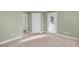 Spacious bedroom featuring two entry points and ample natural light at 1724 Bee Balm Rd, Johns Island, SC 29455