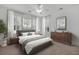 Bright bedroom with carpeted floors and ample natural light at 1724 Bee Balm Rd, Johns Island, SC 29455
