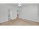 Simple bedroom with carpeted floors and access to bathroom and hallway at 1724 Bee Balm Rd, Johns Island, SC 29455