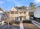 Two-story house with a front porch, walkway, and landscaping at 1724 Bee Balm Rd, Johns Island, SC 29455