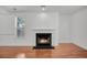 Classic fireplace with a black mantel, adding warmth to the room at 1724 Bee Balm Rd, Johns Island, SC 29455