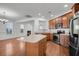Modern kitchen boasts stainless steel appliances and hardwood floors at 1724 Bee Balm Rd, Johns Island, SC 29455