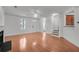 Hardwood floor living room with open concept to dining area and kitchen at 1724 Bee Balm Rd, Johns Island, SC 29455