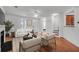 Living room with hardwood floors, fireplace, and comfortable seating area at 1724 Bee Balm Rd, Johns Island, SC 29455