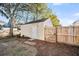 Well-maintained storage shed in a fenced backyard at 1724 Bee Balm Rd, Johns Island, SC 29455