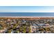 Aerial view of coastal town with beach and ocean at 2256 Ion Ave, Sullivans Island, SC 29482