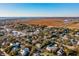 Aerial view of waterfront homes and marsh at 2256 Ion Ave, Sullivans Island, SC 29482