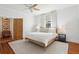 Spacious bedroom with hardwood floors, a king-size bed, and plenty of natural light at 2256 Ion Ave, Sullivans Island, SC 29482