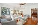 Open living room with a view of the kitchen and entryway at 2256 Ion Ave, Sullivans Island, SC 29482