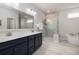 Luxurious bathroom with double vanity, soaking tub and shower at 229 Symphony Ave, Summerville, SC 29486