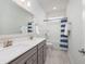 Bathroom boasts double vanity and a shower/tub combo at 229 Symphony Ave, Summerville, SC 29486