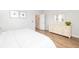 Bright bedroom with dresser and access to bathroom at 229 Symphony Ave, Summerville, SC 29486
