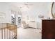 Bright Bedroom features a crib, rocker, and ample storage at 229 Symphony Ave, Summerville, SC 29486