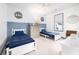 Two twin beds in a shared bedroom with blue accents at 229 Symphony Ave, Summerville, SC 29486