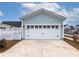 White double garage door with black accents at 229 Symphony Ave, Summerville, SC 29486