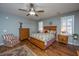 Bright bedroom with wood flooring, ceiling fan, and wood furniture at 2426 Tuscany Dr, North Charleston, SC 29406