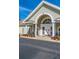 Elegant clubhouse entrance with columns and double doors at 2426 Tuscany Dr, North Charleston, SC 29406