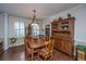 Bright dining room featuring a wood hutch and hardwood floors at 2426 Tuscany Dr, North Charleston, SC 29406