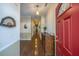 Bright entry hall with hardwood floors and decorative accents at 2426 Tuscany Dr, North Charleston, SC 29406