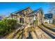 Rear view of house showcasing patio and landscaping at 2426 Tuscany Dr, North Charleston, SC 29406