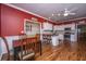 Kitchen with red walls, white cabinets, and stainless steel appliances at 2426 Tuscany Dr, North Charleston, SC 29406
