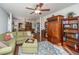 Relaxing living room featuring a built-in entertainment center and hardwood floors at 2426 Tuscany Dr, North Charleston, SC 29406