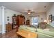 Bright living room with green sectional sofa and access to patio at 2426 Tuscany Dr, North Charleston, SC 29406