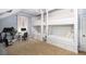 Spacious bedroom with built-in bunks, a workspace, and exercise bike at 3168 Treadwell St, Mount Pleasant, SC 29466