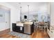 Stylish kitchen with a farmhouse sink, stainless steel appliances, and an island with seating at 3168 Treadwell St, Mount Pleasant, SC 29466