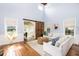 Relaxing living room with a sectional sofa, large windows, and access to a sunroom at 3168 Treadwell St, Mount Pleasant, SC 29466
