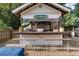 Outdoor pool bar with seating, perfect for entertaining at 3168 Treadwell St, Mount Pleasant, SC 29466