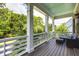 Relaxing screened porch overlooking a lush green landscape at 3168 Treadwell St, Mount Pleasant, SC 29466