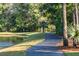 Scenic walking trail alongside a peaceful pond at 3168 Treadwell St, Mount Pleasant, SC 29466