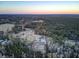 Aerial view of home, pool, and surrounding neighborhood at 320 Harry Ln, Moncks Corner, SC 29461