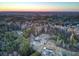 Aerial view of property showcasing house and surrounding trees at 320 Harry Ln, Moncks Corner, SC 29461