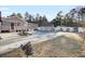 Spacious backyard with refreshing pool and lounge chairs at 320 Harry Ln, Moncks Corner, SC 29461
