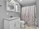 Clean bathroom with a shower/tub combo, single vanity, and updated fixtures at 320 Harry Ln, Moncks Corner, SC 29461