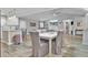 Open concept dining area with hardwood floors and view into the kitchen at 320 Harry Ln, Moncks Corner, SC 29461