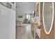 Bright and airy entryway with wood floors and view of living room at 320 Harry Ln, Moncks Corner, SC 29461