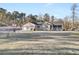Ranch home with 3-car garage, large yard, and basketball court at 320 Harry Ln, Moncks Corner, SC 29461