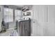 Bright laundry room with washer, dryer, and window at 320 Harry Ln, Moncks Corner, SC 29461
