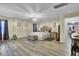 Spacious main bedroom with hardwood floors and ensuite bathroom at 320 Harry Ln, Moncks Corner, SC 29461