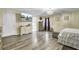 Spacious main bedroom with hardwood floors and ensuite bathroom at 320 Harry Ln, Moncks Corner, SC 29461