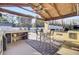 Outdoor kitchen with built-in grill and ample counter space at 320 Harry Ln, Moncks Corner, SC 29461
