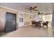 Outdoor space with a screened porch, ceiling fan, and dining furniture at 320 Harry Ln, Moncks Corner, SC 29461